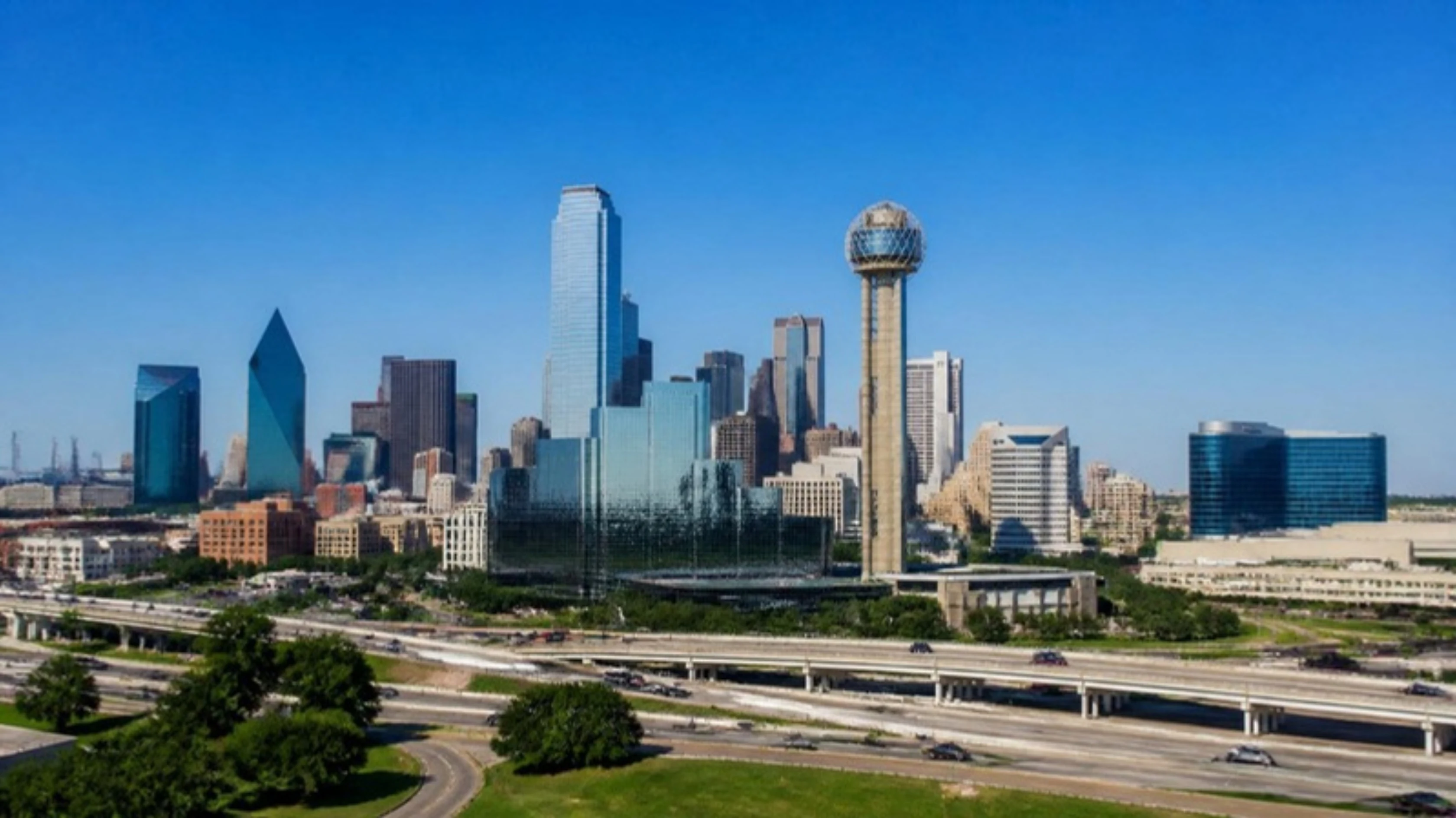 The Dallas skyline featuring Reunion Tower, GuestBrands SEO and digital marketing services